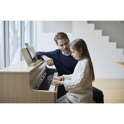 Roland HP704 Digital piano