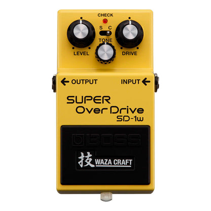 gul guitar effektpedal med drejeknapper og waza craft mærkat