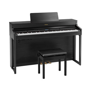 Sort digitalpiano med tilhørende bænk og tre pedaler i et moderne design