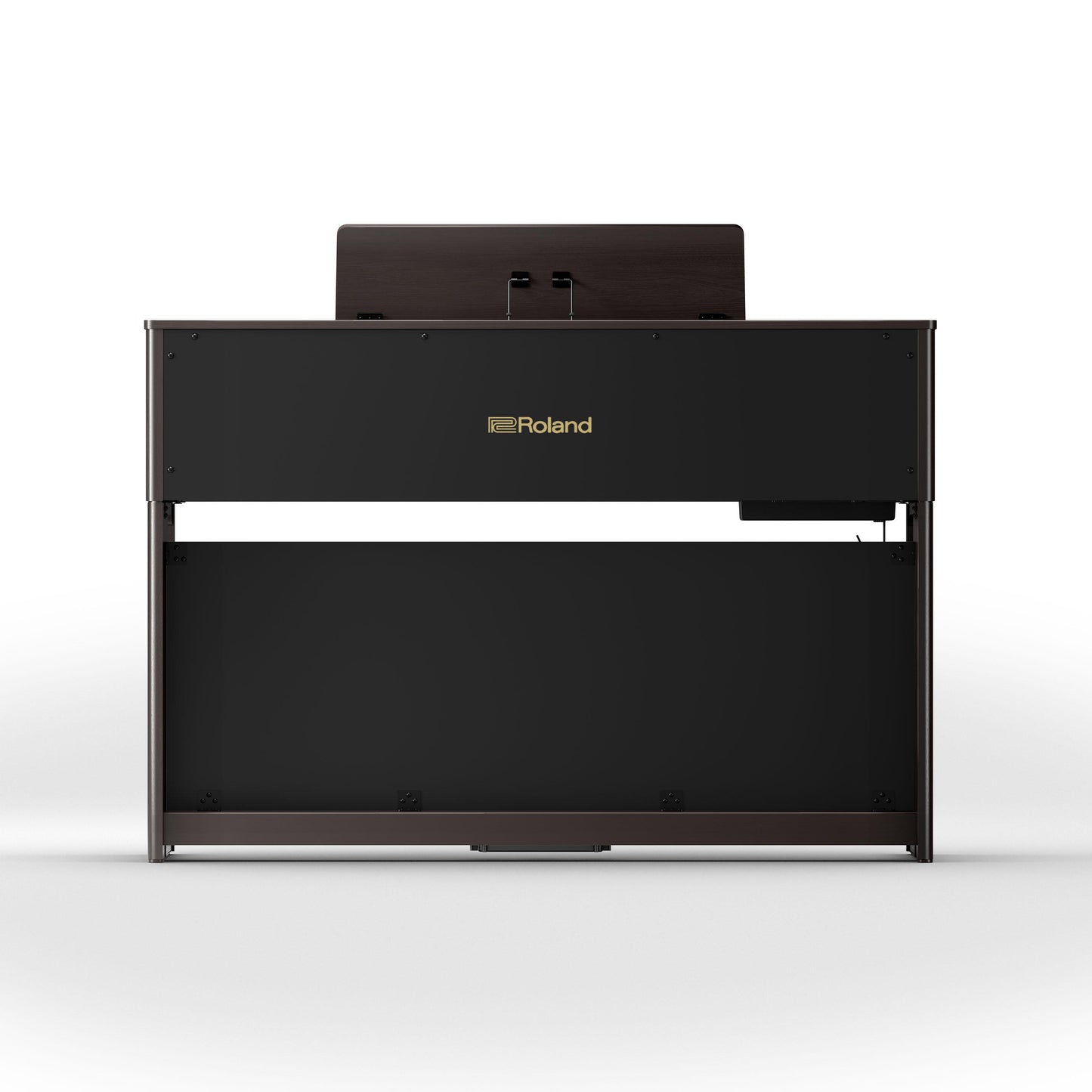 Digitalt klaver i mørkt træ med elegant finish set bagfra med musikstativ