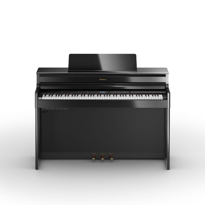 Sort digitalpiano med klaverbygning og tre pedaler i elegant design